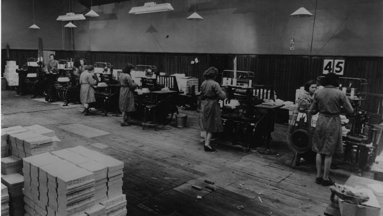 Employees working in the Nelson and Sons bindery.